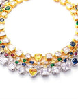 Pharrell Williams grills are studded with sapphires, rubies and emeralds. INFINITY GAUNTLETS jewelry diamond choker jacob & co short necklace gemstone heart Gabby Elan Jewelry infinity stone grillz grill grills