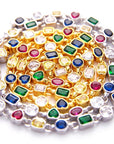 Pharrell Williams grills are studded with sapphires, rubies and emeralds. INFINITY GAUNTLETS jewelry diamond choker jacob & co short necklace gemstone heart Gabby Elan Jewelry infinity stone grillz grill grills