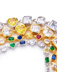 Pharrell Williams grills are studded with sapphires, rubies and emeralds. INFINITY GAUNTLETS jewelry diamond choker jacob & co short necklace gemstone heart Gabby Elan Jewelry infinity stone grillz grill grills