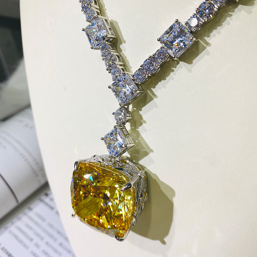 Beyoncé's Tiffany &amp; Co diamond necklace is worth $30 million harpersbazaar.com tiffany yellow diamond necklace beyonce' from The 128-carat yellow diamond was worn by Hepburn during the Breakfast At Tiffany's press tour in 1961, and was seen again on Lady Gaga