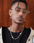 Travis Scott recently got pretty generous with his team, gifting his inner circle iced-out Takashi Murakami-designed chains from Eliantte