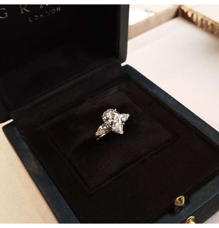 asap rocky pear diamond ring unique three stone engagement ring jeweler vvs 