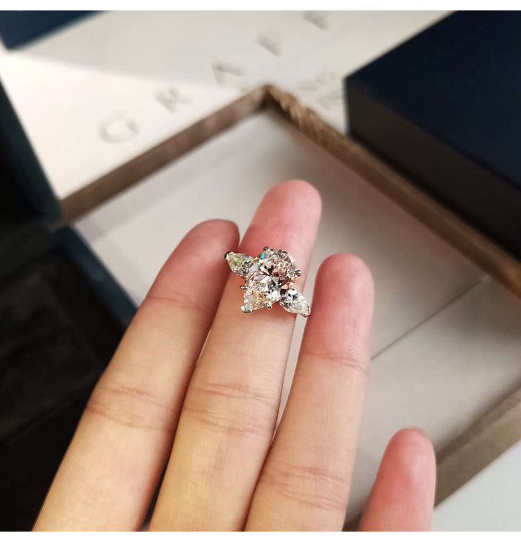 asap rocky pear diamond ring unique three stone engagement ring jeweler vvs 