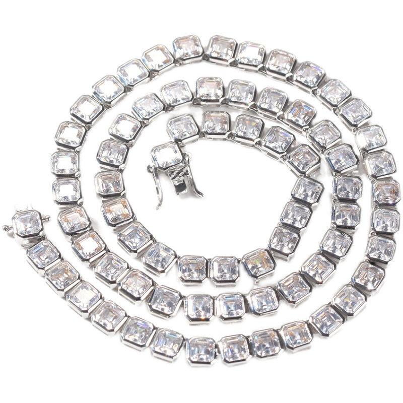 Emerald Cut Diamond Eternity Line Tennis Bracelet in white gold diamonds fine jewelery celebrity jewelers