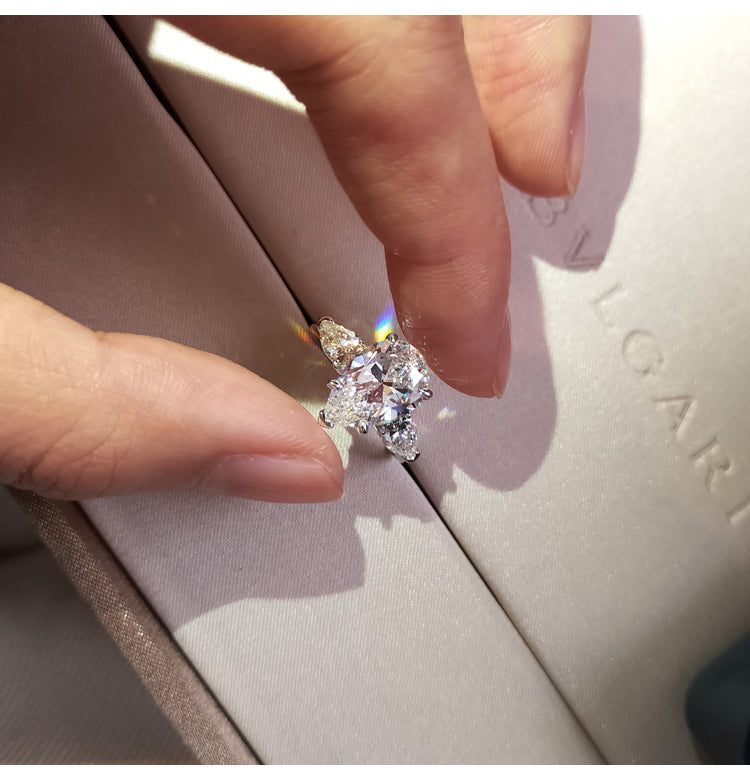 asap rocky pear diamond ring unique three stone engagement ring jeweler vvs 