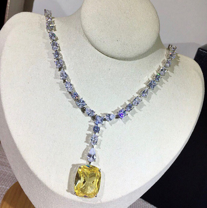 Beyoncé's Tiffany &amp; Co diamond necklace is worth $30 million harpersbazaar.com tiffany yellow diamond necklace beyonce' from The 128-carat yellow diamond was worn by Hepburn during the Breakfast At Tiffany's press tour in 1961, and was seen again on Lady Gaga