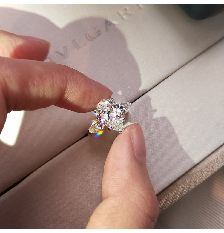 asap rocky pear diamond ring unique three stone engagement ring jeweler vvs 