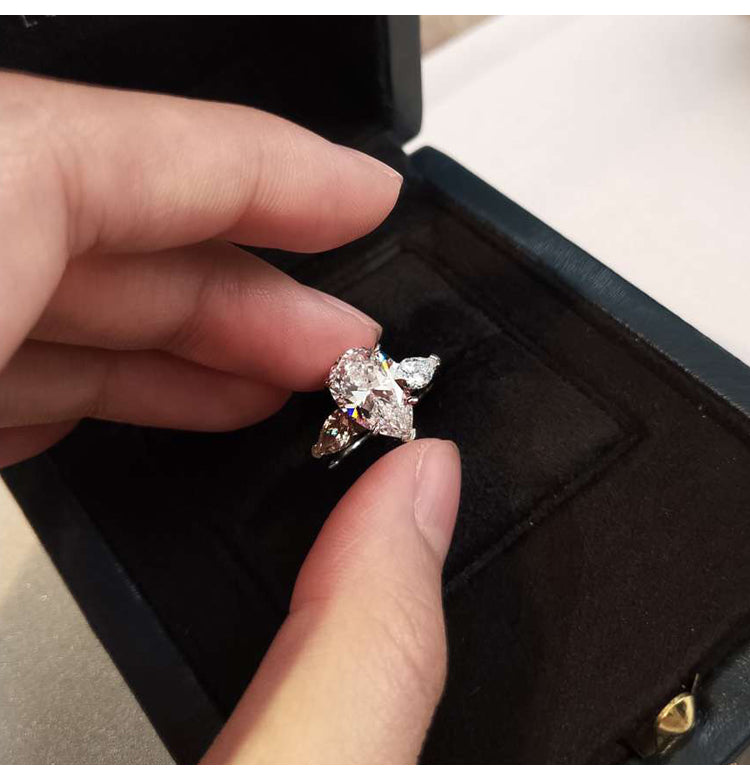 asap rocky pear diamond ring unique three stone engagement ring jeweler vvs 