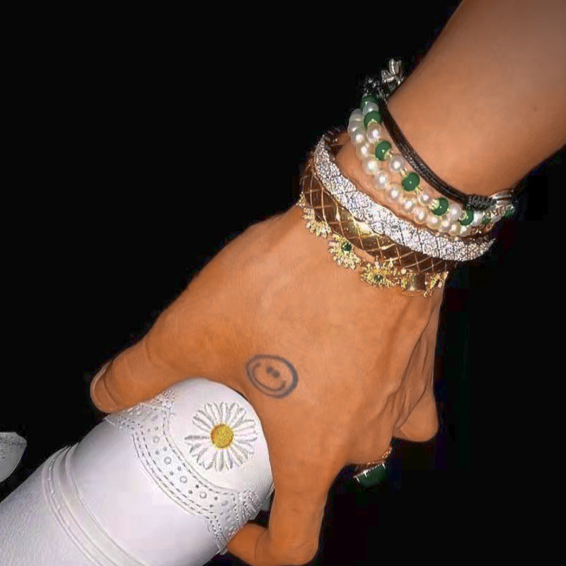 PEACEMINUSONE SS22 Accessory Release | HYPEBEAST buy gdragon kpop japan daisy flower diamond bracelet CL lisa korean artist jewelry must get