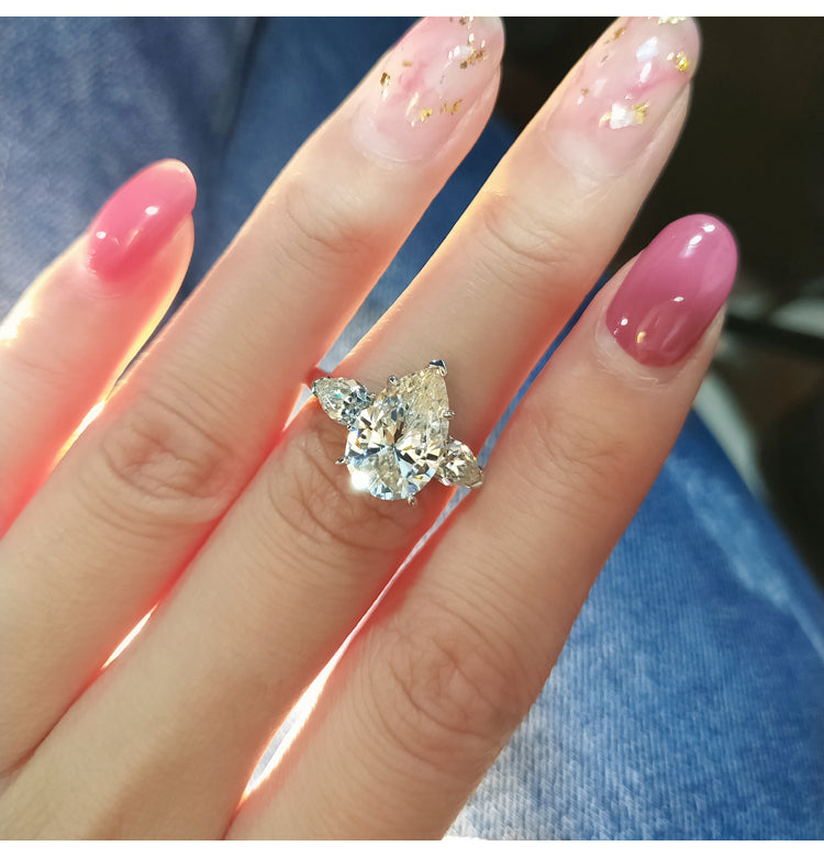 asap rocky pear diamond ring unique three stone engagement ring jeweler vvs 