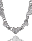 Grammys 2022 diamond heart necklace Megan Thee Stallion rocks an icy blonde bob and a sparkly mini dress Daily Mail diamond heart necklace hip hop jewelry celebrity jewelers