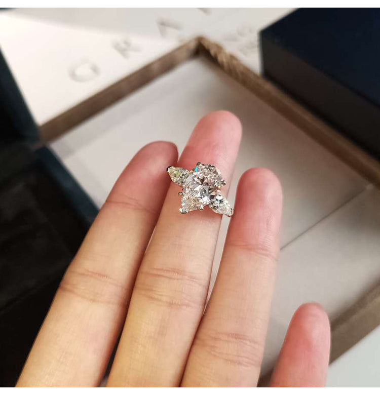 asap rocky pear diamond ring unique three stone engagement ring jeweler vvs 