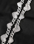 Grammys 2022 diamond heart necklace Megan Thee Stallion rocks an icy blonde bob and a sparkly mini dress Daily Mail diamond heart necklace hip hop jewelry celebrity jewelers