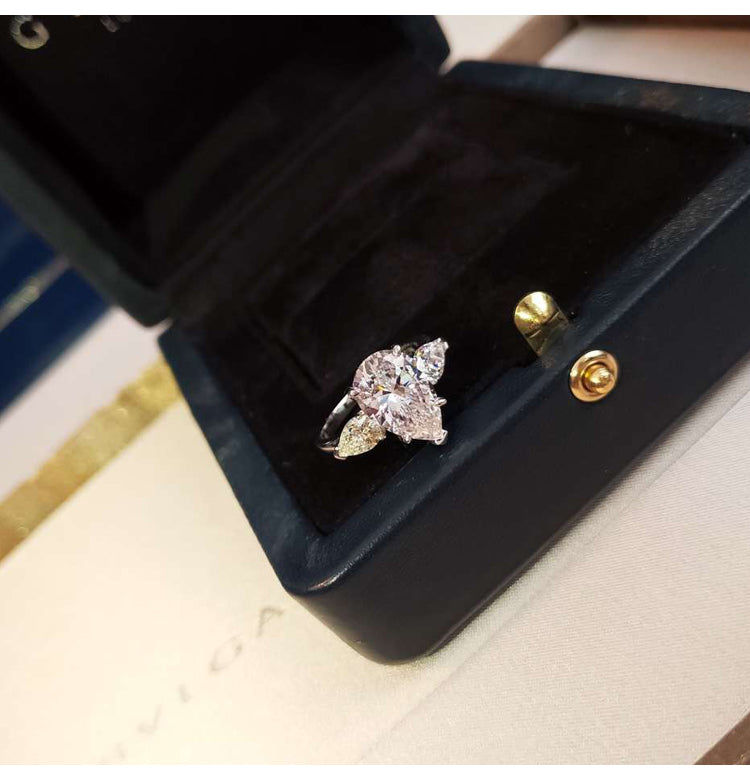 asap rocky pear diamond ring unique three stone engagement ring jeweler vvs 