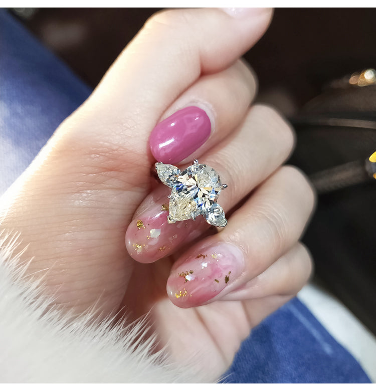 asap rocky pear diamond ring unique three stone engagement ring jeweler vvs 