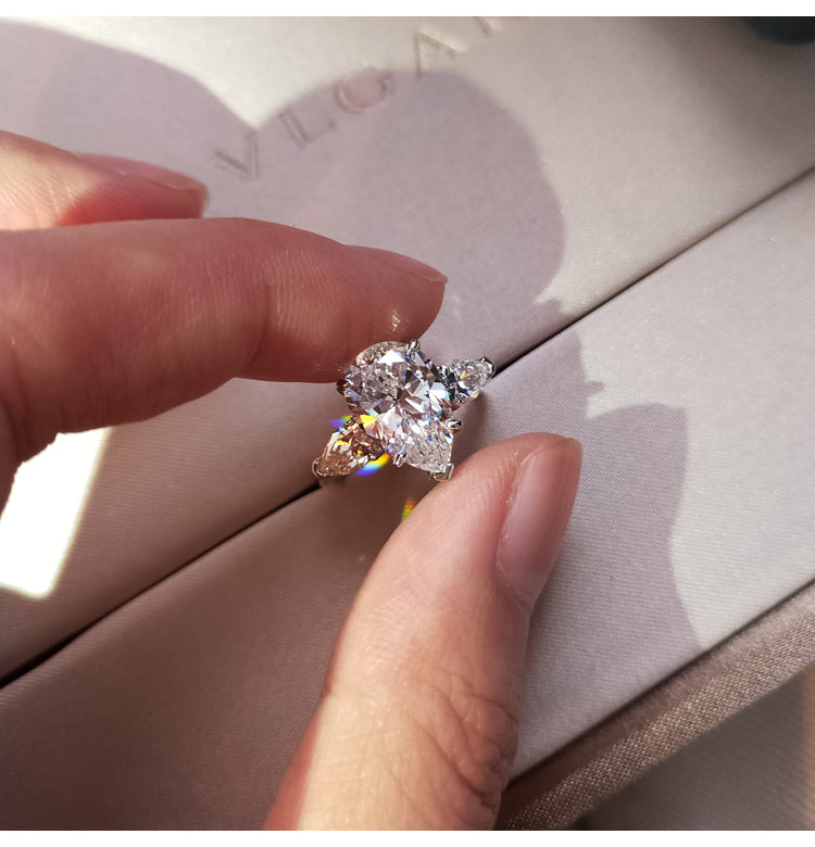 asap rocky pear diamond ring unique three stone engagement ring jeweler vvs 