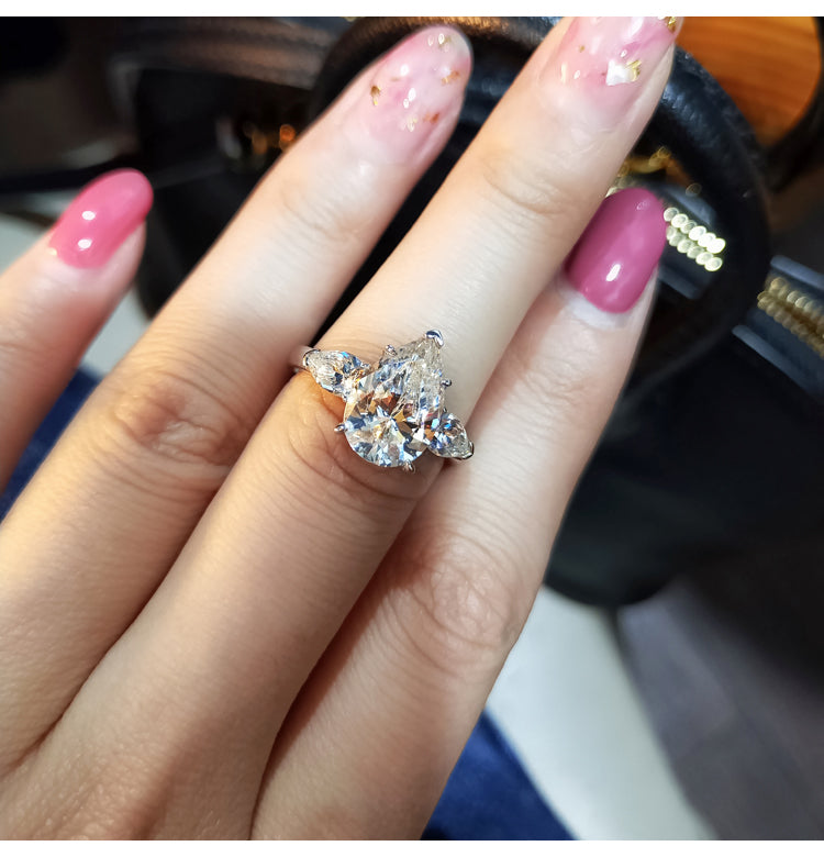 asap rocky pear diamond ring unique three stone engagement ring jeweler vvs 