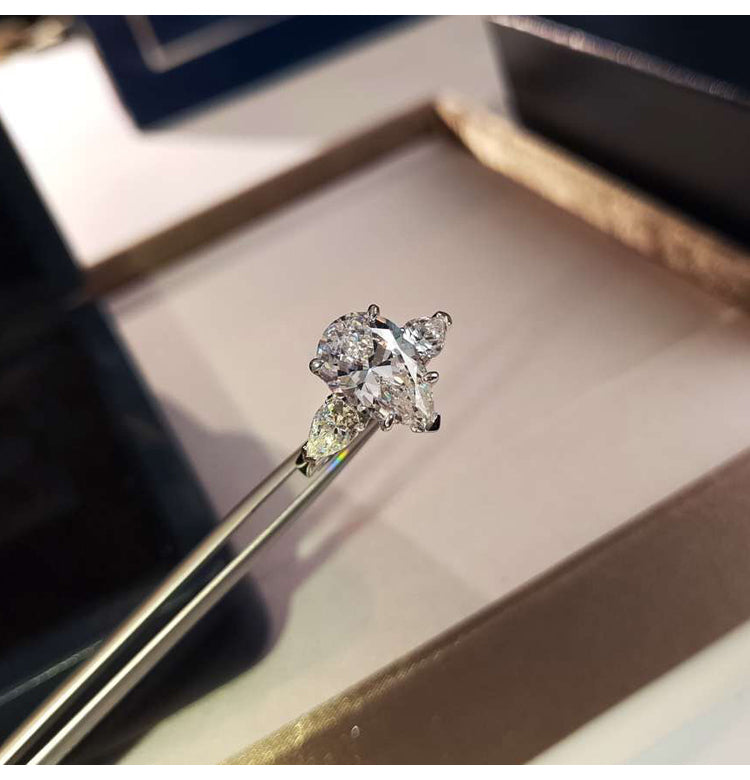 asap rocky pear diamond ring unique three stone engagement ring jeweler vvs 