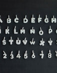 custom alphabet letter bubble nano greg yuna diamond silver white gold celebrity jewelers ifandco