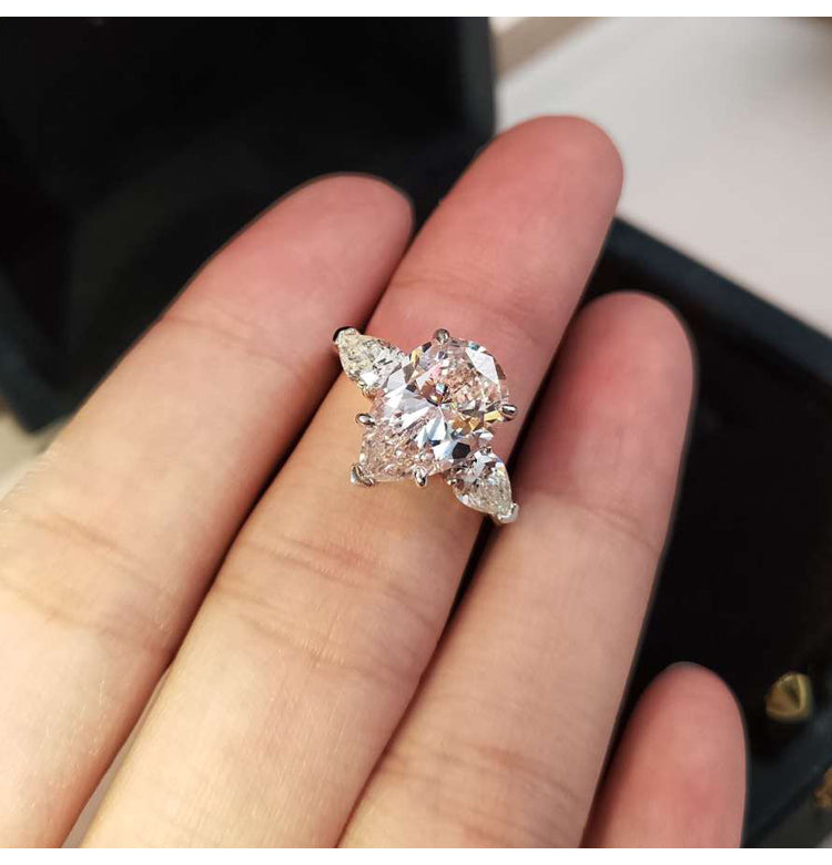 asap rocky pear diamond ring unique three stone engagement ring jeweler vvs 