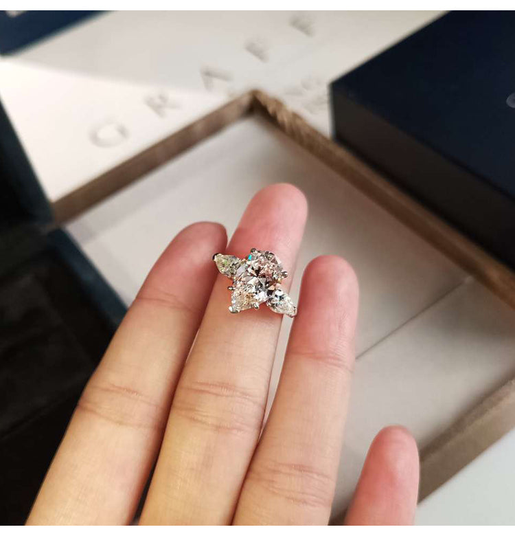 asap rocky pear diamond ring unique three stone engagement ring jeweler vvs 
