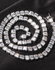 Emerald Cut Diamond Eternity Line Tennis Bracelet in white gold diamonds fine jewelery celebrity jewelers